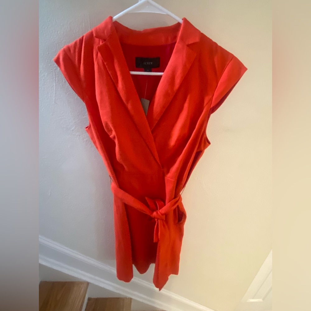 J.Crew dress.  Color burnt orange size 0.  Tie at waist with pockets.  With Tags